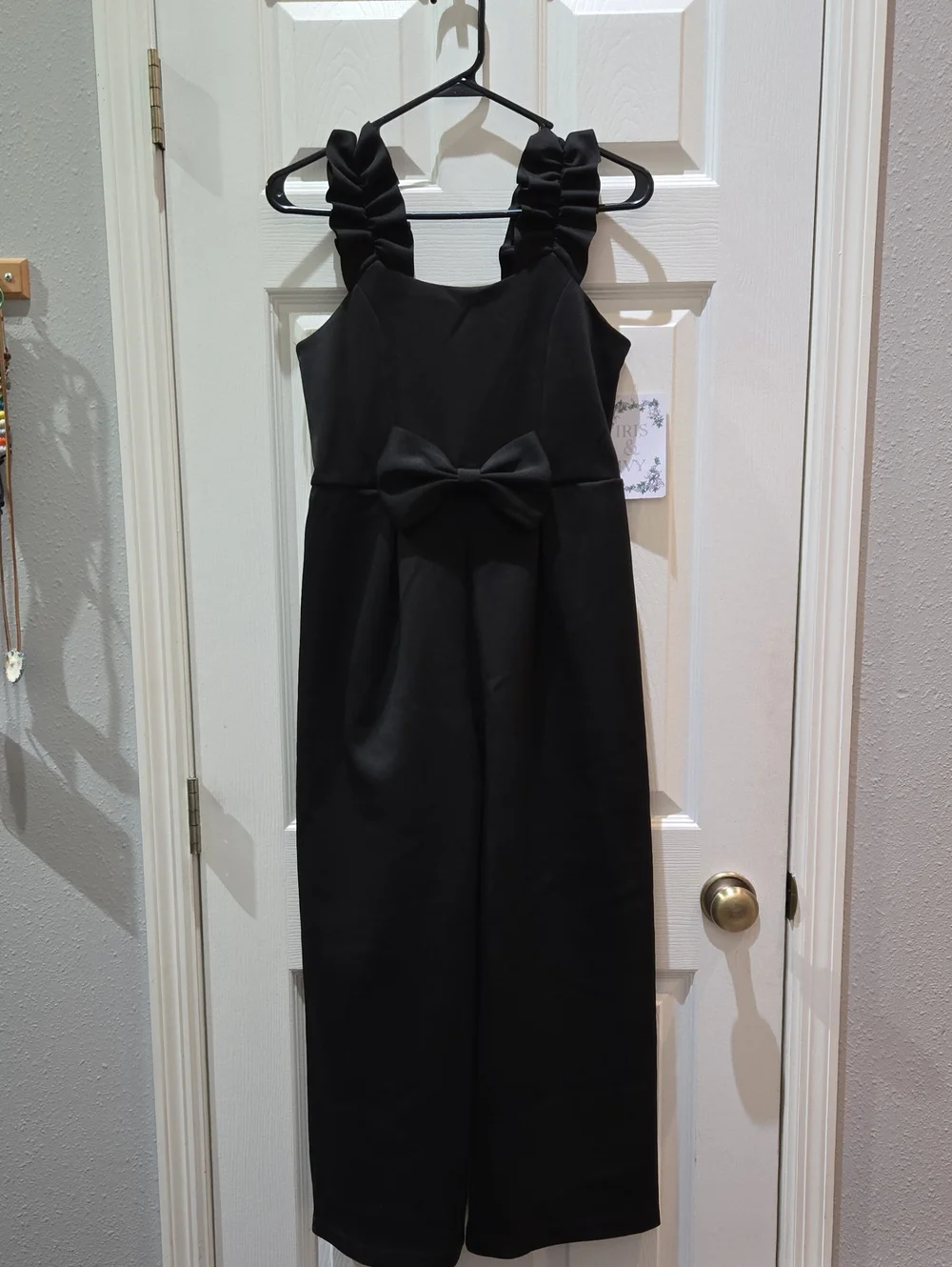 Girls Black Ruffle-Strap Romper with Bow